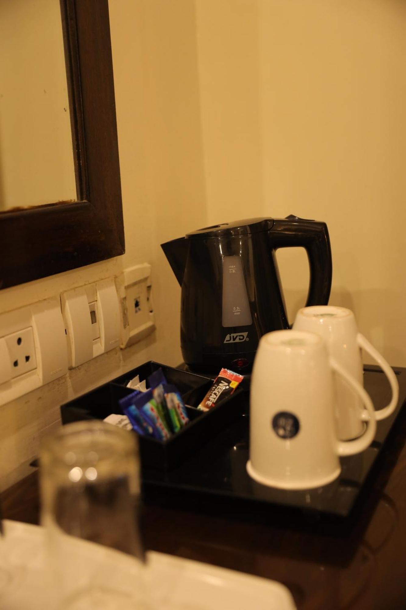 Hotel Bluestone Nehru Place By The Cosy Hotels Нью-Дели Экстерьер фото